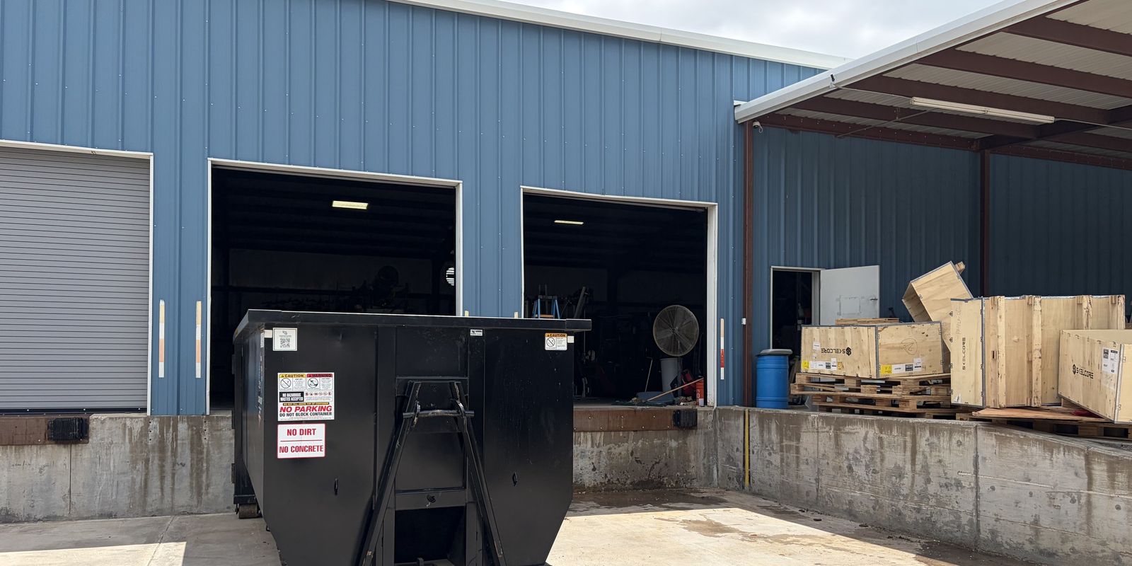 25 Yard Lone Wolf Dumpster at Commercial Facility